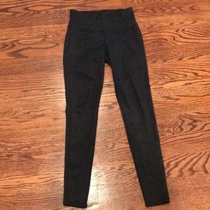 Athleta black leggings subtle snake print detail